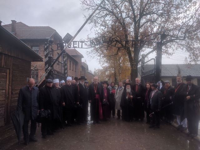 The religious leaders at the entrance to the Auschwitz concentration camp